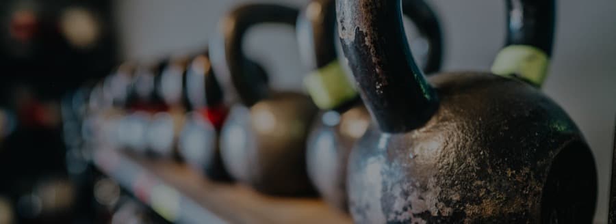 The kettlebell rack on the gym floor